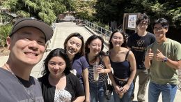 Mr. Jan takes a selfie with some of his past students.